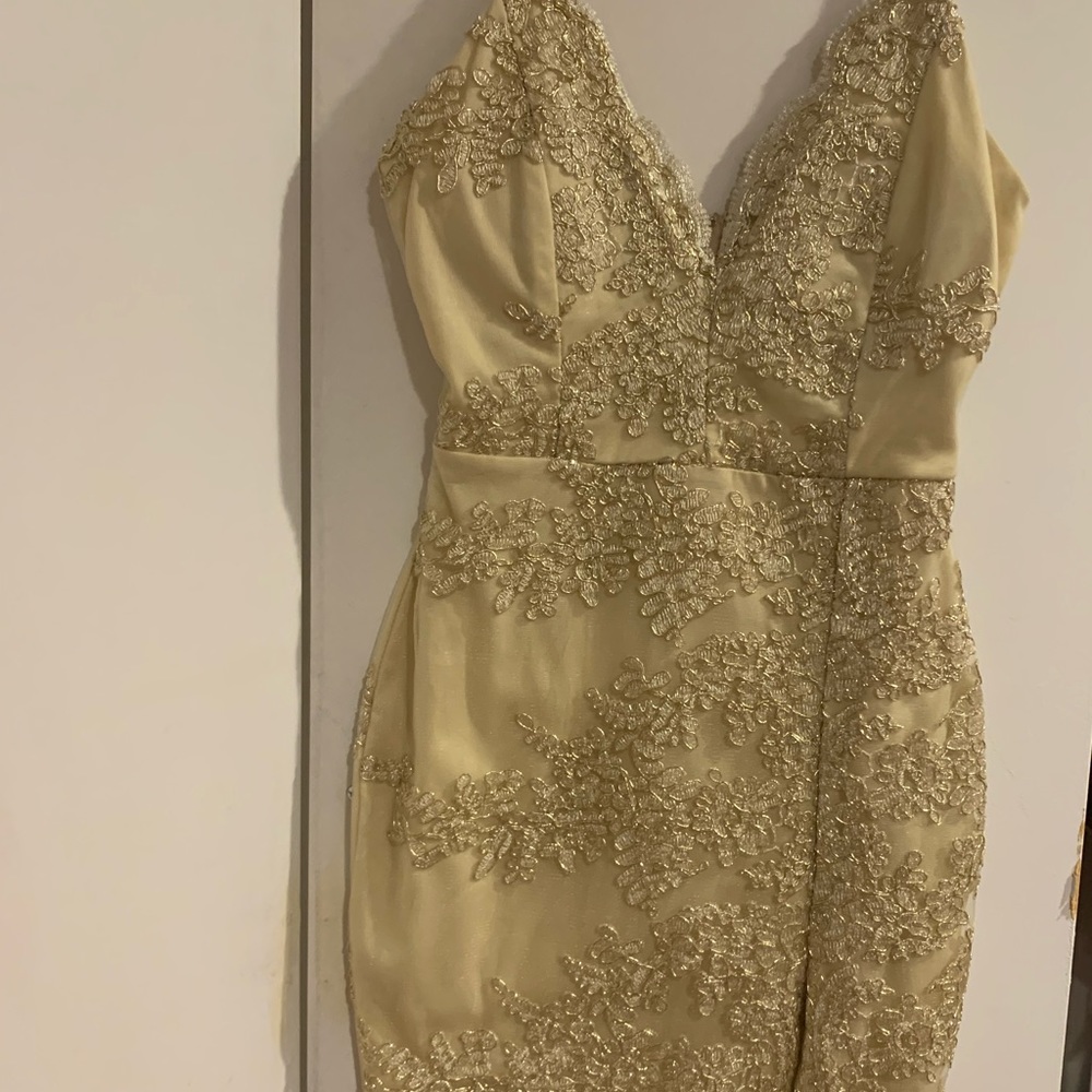 Gold spaghetti strap dress with small thigh split